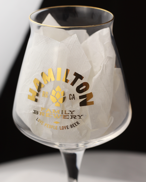 Teku Glass with gold font. "Hamilton Family Brewery" "RC CA" "Love People Love Beer"
